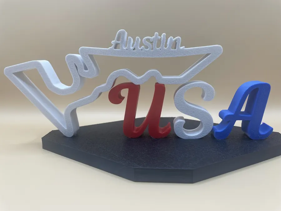 Sculpture décorative imprimée en 3D représentant le tracé du circuit de Austin (COTA), socle avec les couleurs USA.