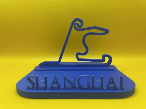 Sculpture décorative imprimée en 3D représentant le tracé du circuit de Shanghai, sur un socle simple et élégant.