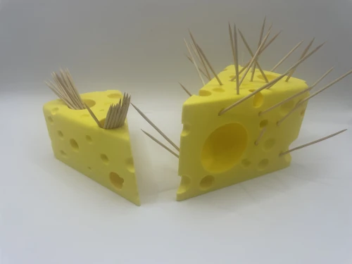 Bloc de fromage jaune imprimé en 3D servant de distributeur de cure-dents original.
