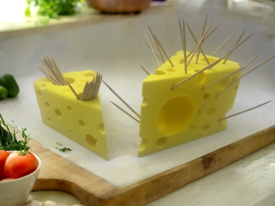 Bloc de fromage jaune imprimé en 3D servant de distributeur de cure-dents original.