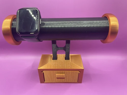 Support montre imprimé en 3D, version noire et bronze, avec tiroir de rangement.