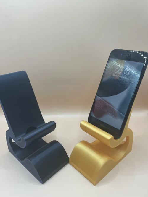 Support de téléphone 3D imprimé, version noire et version dorée, finition moderne.